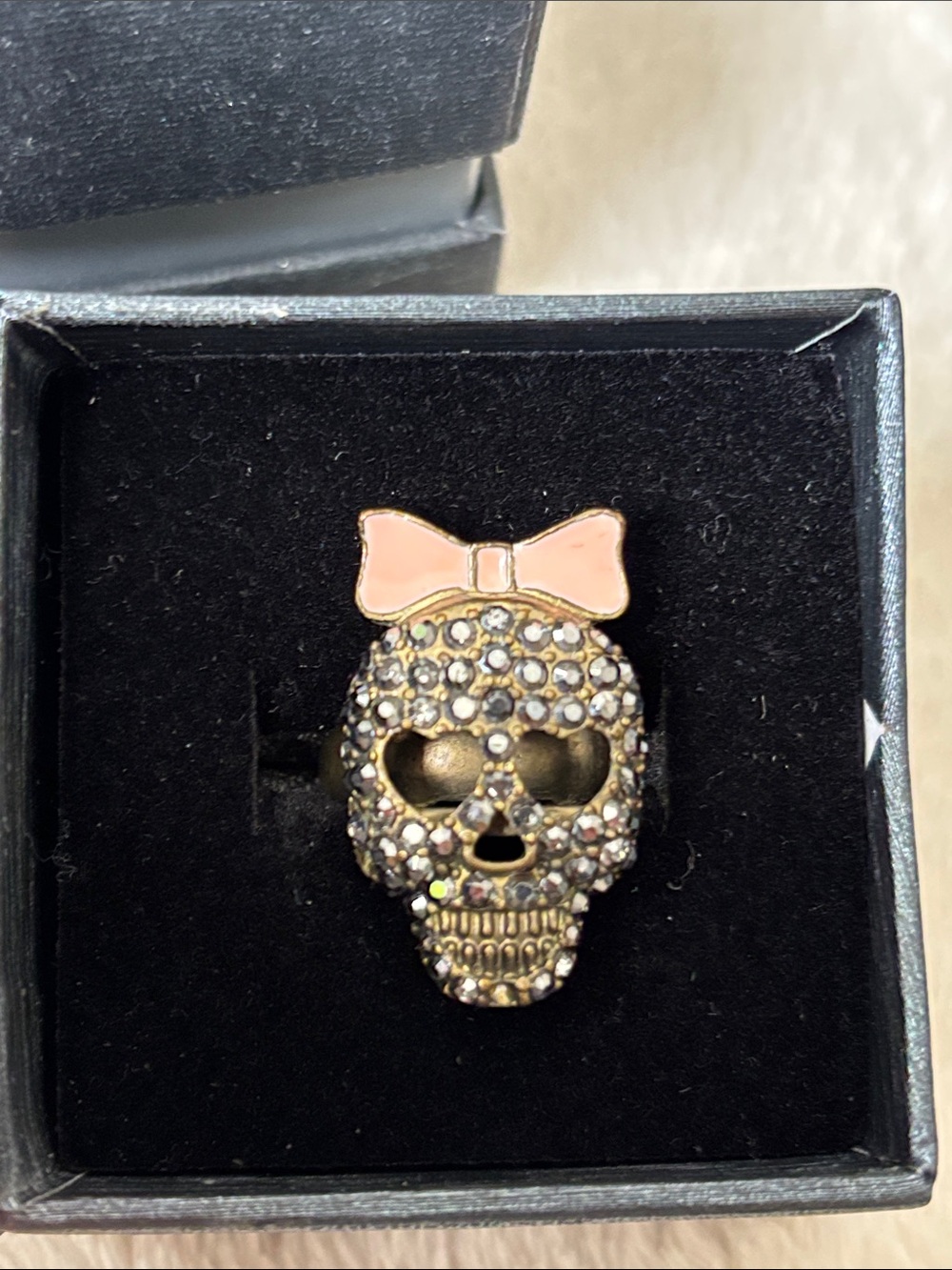 Betsey Johnson Gold-Tone Crystal Skull Ring with Pink Bow